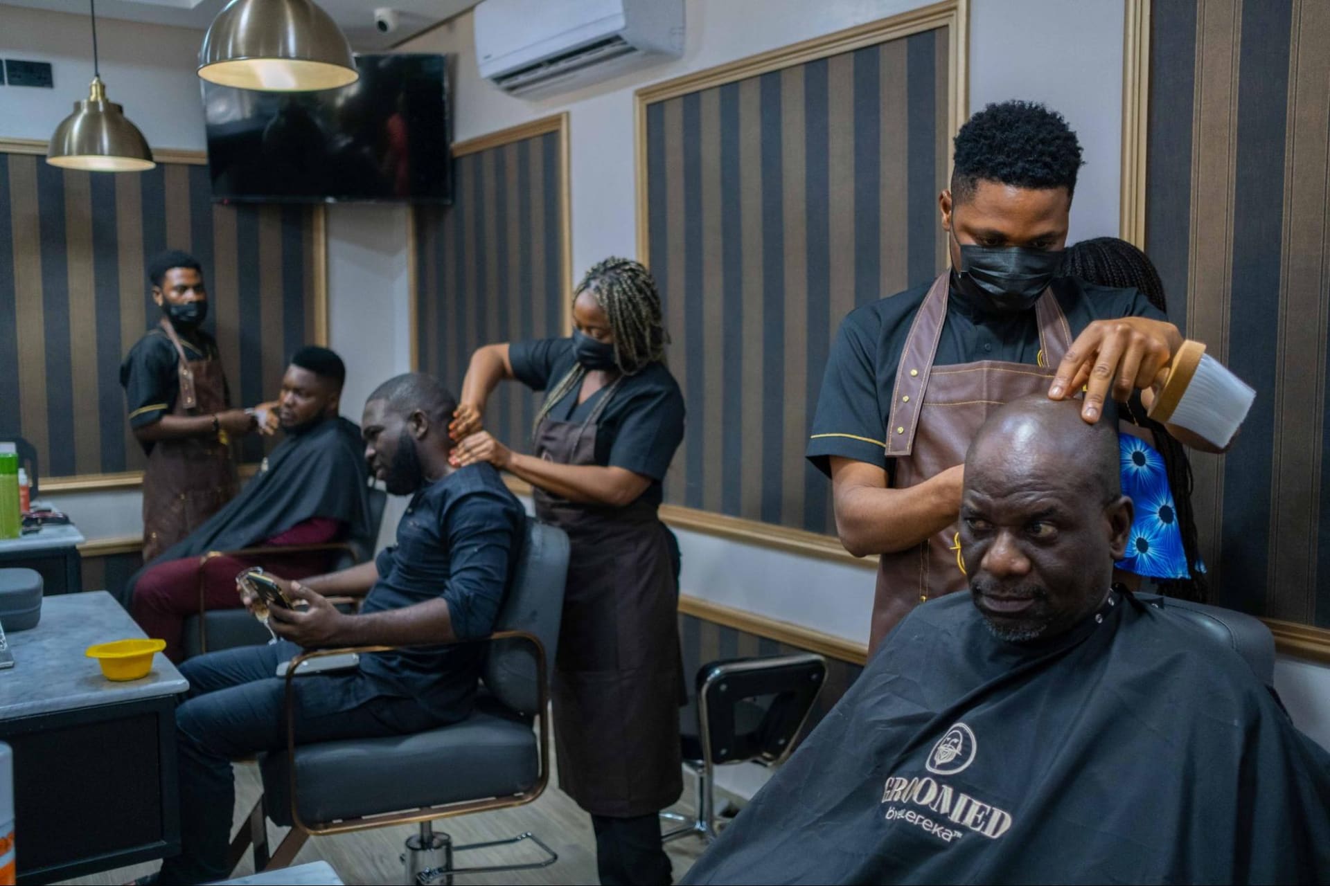 Barber shop in Port Harcourt running on solar with lights and clippers operating